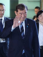 Prime Minister Shigeru Ishiba enters the prime minister's office in Tokyo on Thursday.