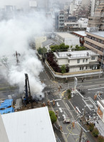 White smoke rises around the site of the explosion in Tokyo's Edogawa Ward on Tuesday. (Courtesy of a reader).