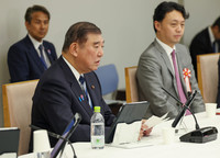 Japanese Prime Minister Shigeru Ishiba speaks at a meeting on AI strategy at the prime minister's office on Monday.
