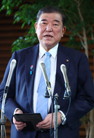 Japanese Prime Minister Shigeru Ishiba speaks to reporters at the prime minister's office in Tokyo on Wednesday.