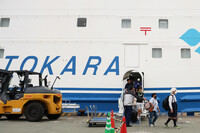 Evacuees from Akusekijima, a remote island in southwestern Japan, arrive at Kagoshima Port Friday afternoon.