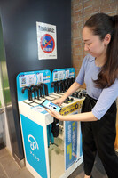 Rental spot for sun umbrellas set up in front of JR's Yurakucho Station in Tokyo's Chiyoda Ward
