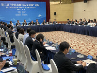 Japanese and Chinese researchers discuss social challenges and bilateral cooperation in a forum held in Beijing on Sunday.
