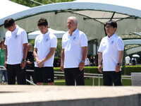 Brazilian soccer legend Zico (second from right) visits the cenotaph at Hiroshima's Peace Memorial Park on Sunday to lay flowers and offer a prayer to those who died due to the U.S. atomic bombing of the western Japan city on Aug. 6, 1945, in the closing days of World War II.
