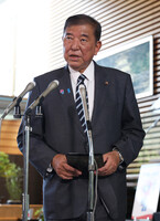 Prime Minister Shigeru Ishiba speaks to reporters in Tokyo on Tuesday.
