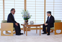 Japan's Emperor Naruhito meets with Micronesian President Wesley Simina at the Imperial Palace in Tokyo on Tuesday.
