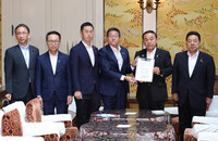 Parliamentary affairs chiefs of Japan's six ruling and opposition parties, at a meeting on Wednesday, agree to scrap the provisional add-on gasoline tax rate as early as possible this year.