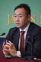 Japanese Justice Minister Keisuke Suzuki speaks at a press conference in Tokyo on Wednesday.